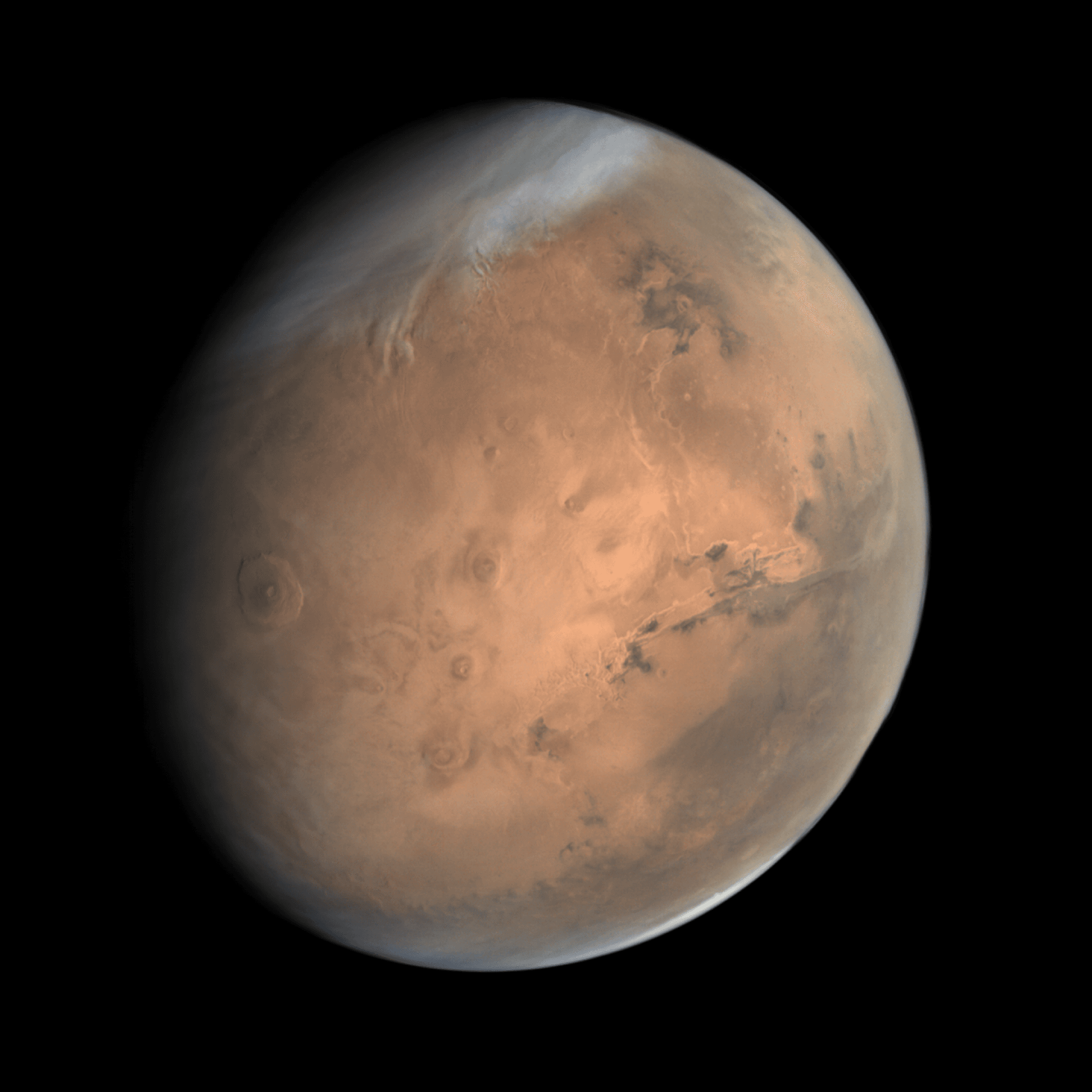 True-colour view of the whole Martian disc built from Mars Colour Camera frames taken on 10 October 2014 from about 76,000 km, showing the Tharsis volcanoes and Valles Marineris, processed by Justin Cowart from ISRO's archived data.