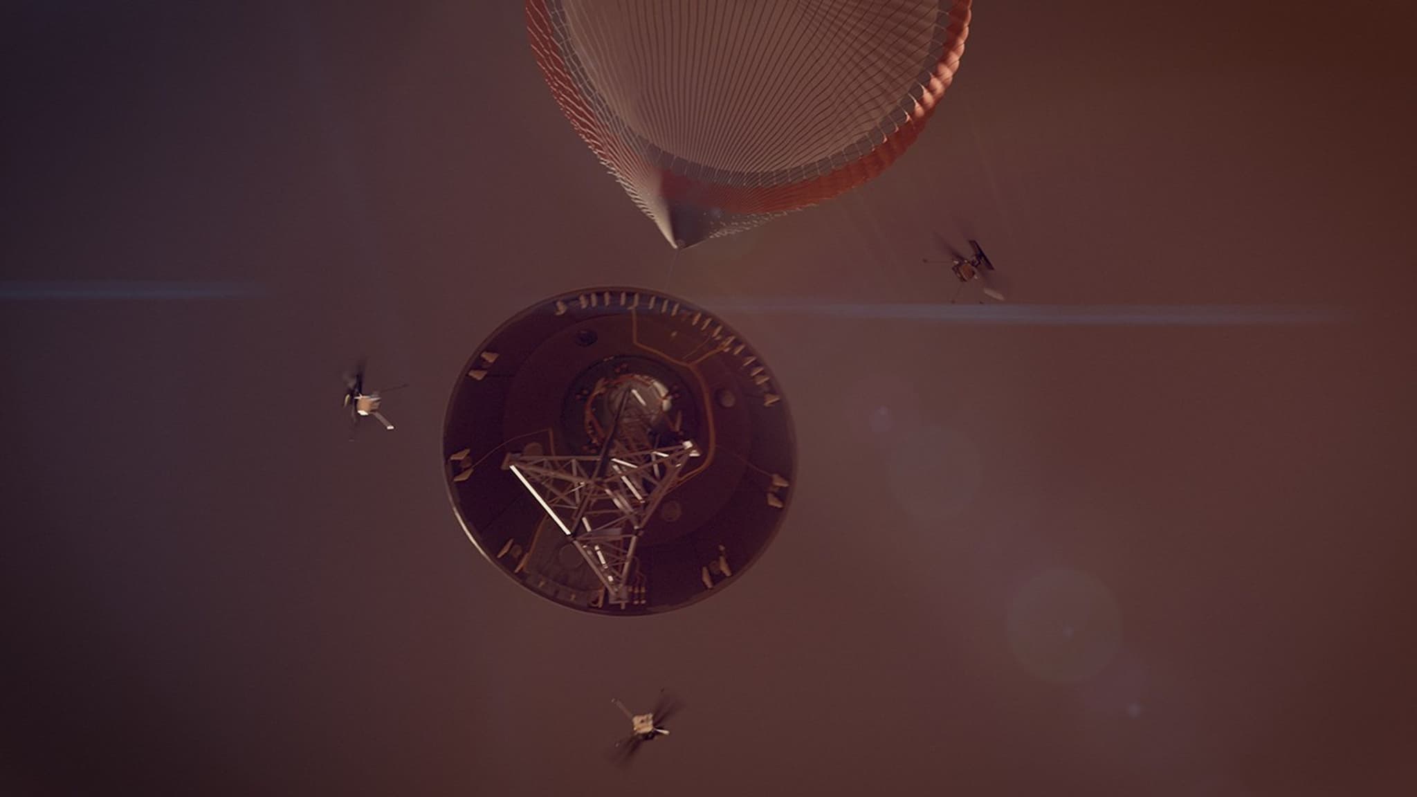 A NASA artist's concept of the SkyFall manoeuvre, seen from below, with three small helicopters flying away from the aeroshell while it still hangs beneath its inflated parachute in the Martian atmosphere.