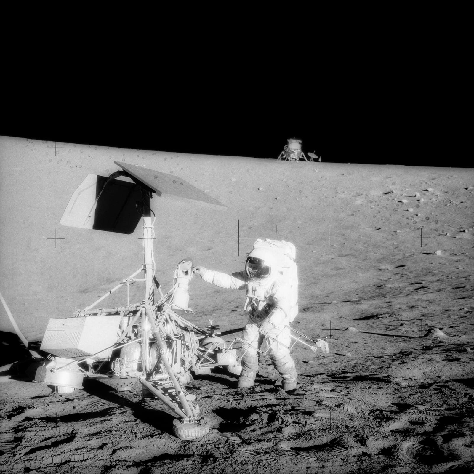 Conrad at Surveyor 3, Intrepid in the background (AS12-48-7134, 20 Nov 1969)