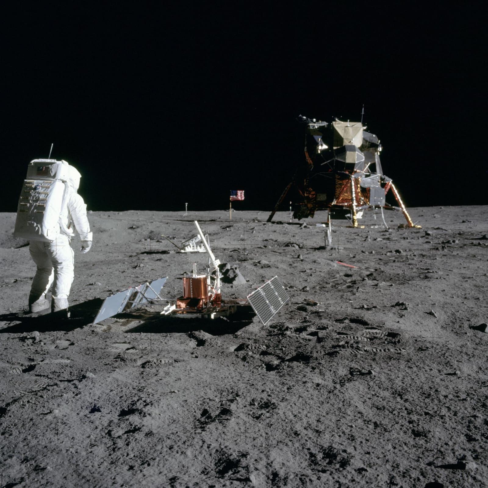 Photograph: Buzz Aldrin at Tranquility Base on 20 July 1969 (US time), with Apollo 11's Passive Seismic Experiment Package in the foreground, its two solar panels spread